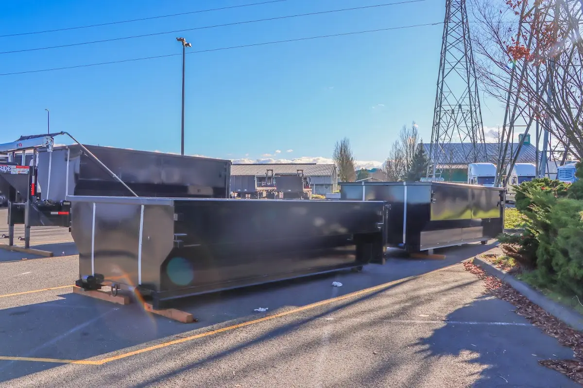 Roll-off dumpster ready for waste disposal at job site for 2 Yard Dumpster Rental in University Park